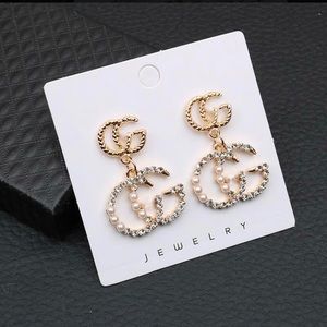 Gucci emblem dangle earrings